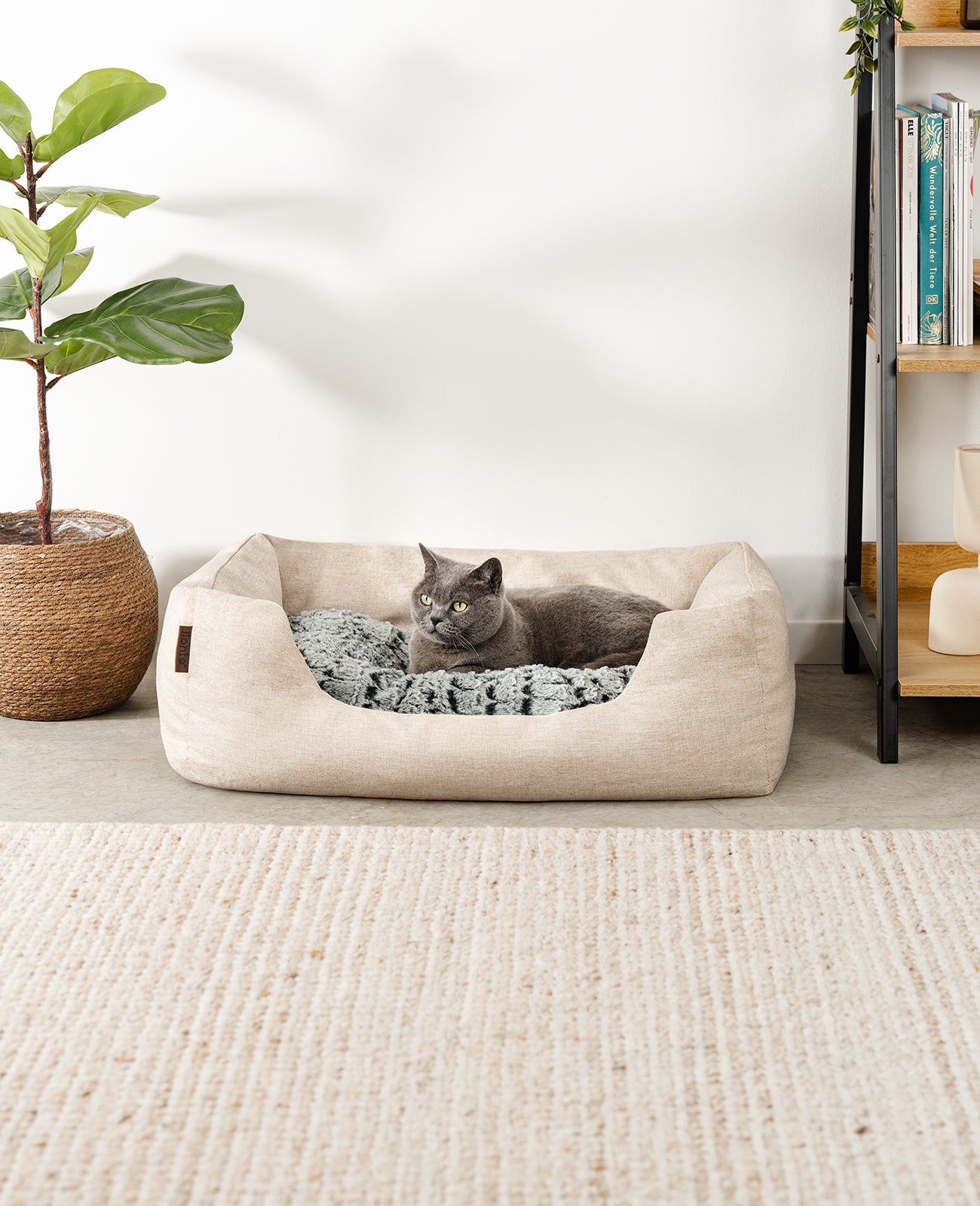 Cama para gatos con cojín reversible y tejido exterior moteado