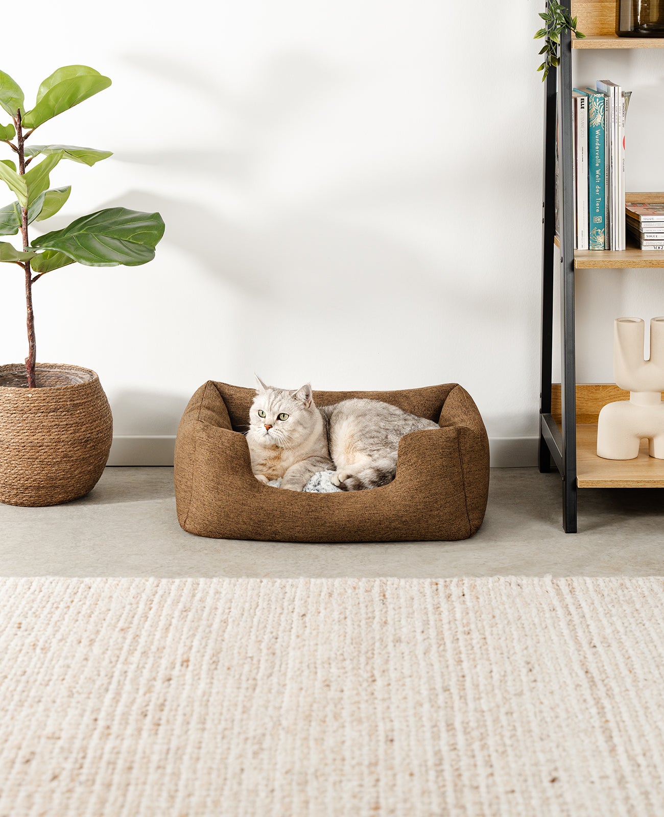 Cama para gatos con cojín reversible y tejido exterior moteado