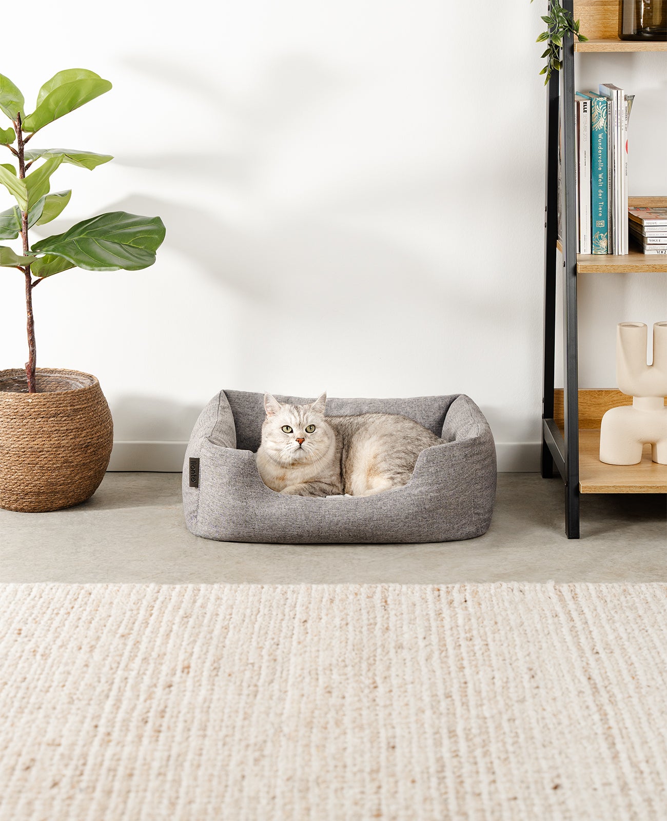 Cama para gatos con cojín reversible y tejido exterior moteado