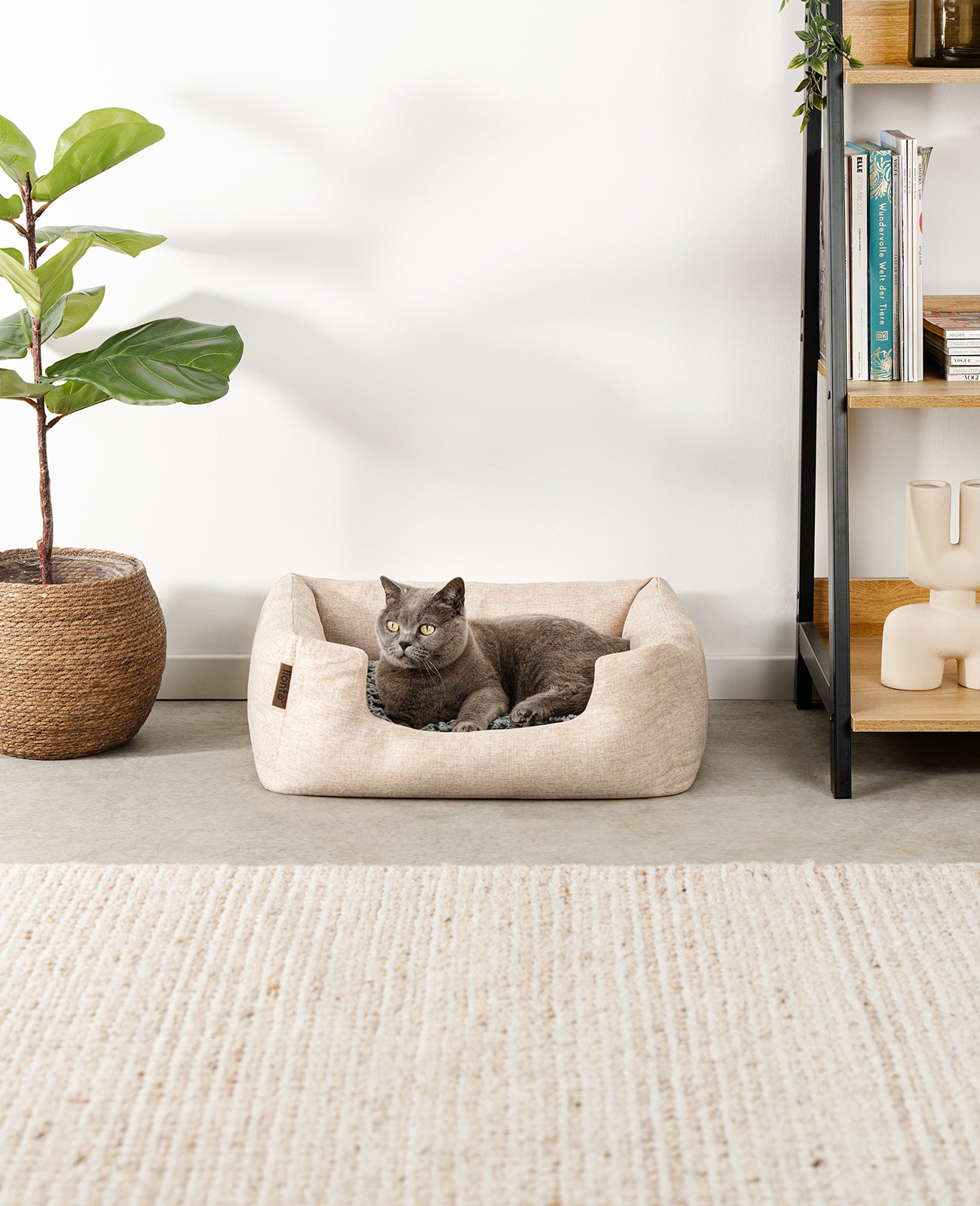Cama para gatos con cojín reversible y tejido exterior moteado