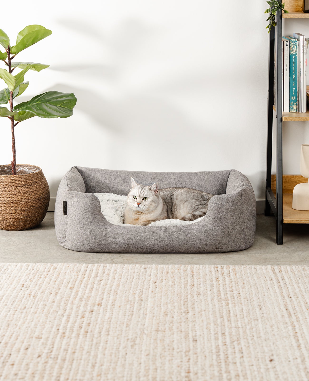 Cama para gatos con cojín reversible y tejido exterior moteado